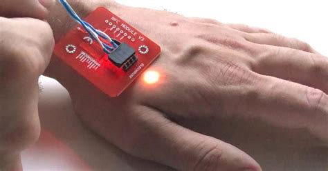 nfc tag under skin|The microchip implants that let you pay with your .